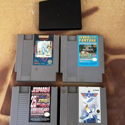 (4) NES Cartridges Untested. +1 Black Sleeve
