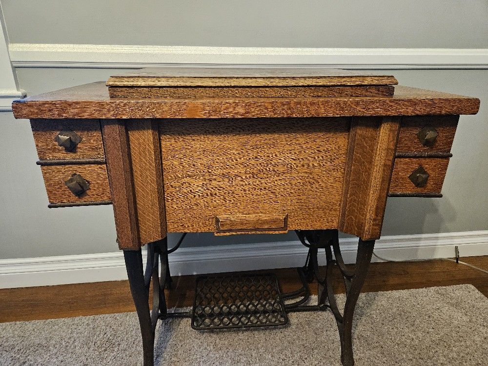 Antique Sewing Machine And Cabinet
