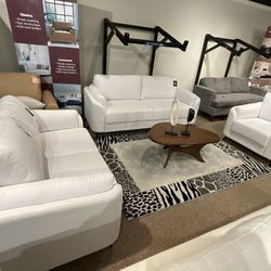 New 3 piece Sofa loveseat and chair by Serta.