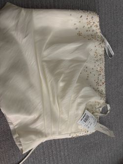 New with tags Strapless Wedding Gown