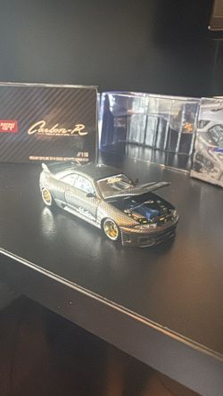 Kaido House x Mini GT 1:64 Nissan Skyline GT-R (R33) Active Carbon R V1