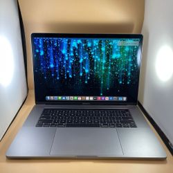 Apple MacBook Pro 15” 2019 6Core i7 32GB 256GB Fully Working Radeon Pro 555X Graphics