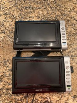 Set of two Audiovox twin DVD players for the car
