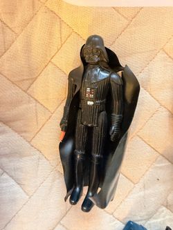 vintage Kenner Star Wars Darth Vader action figure.