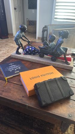 Louis Vuitton Soft Trunk wallet Black, Excellent Condition .