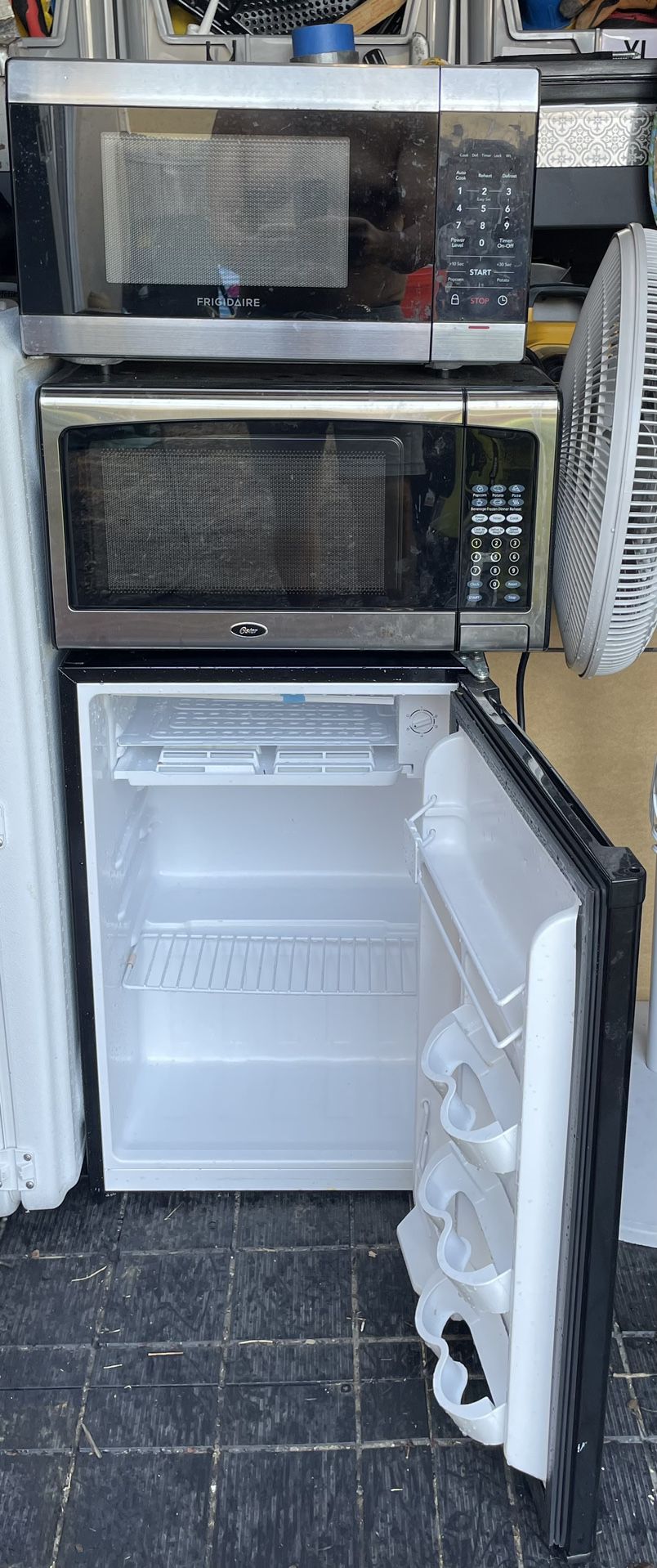 Two Microwaves and a Fridge
