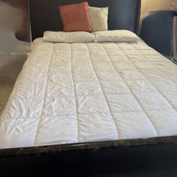 Gray and black was a marble look, queen bed