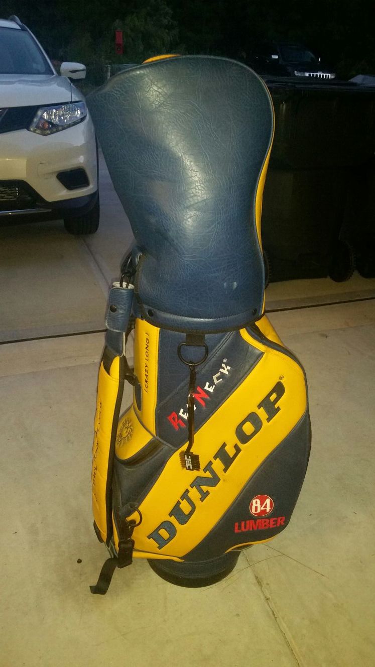 John Daly Dunlop leather golf bag and clubs