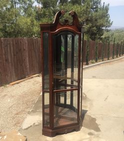 Howard Miller Curio With Glass Shelvings (glass shelvings not shown in pictures)