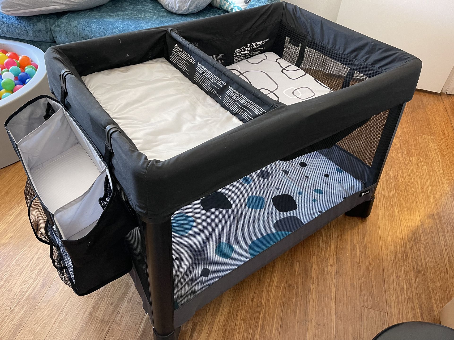 4 Moms Pack N Play, Bassinet, Sheet, Changing Table And Diaper Storage