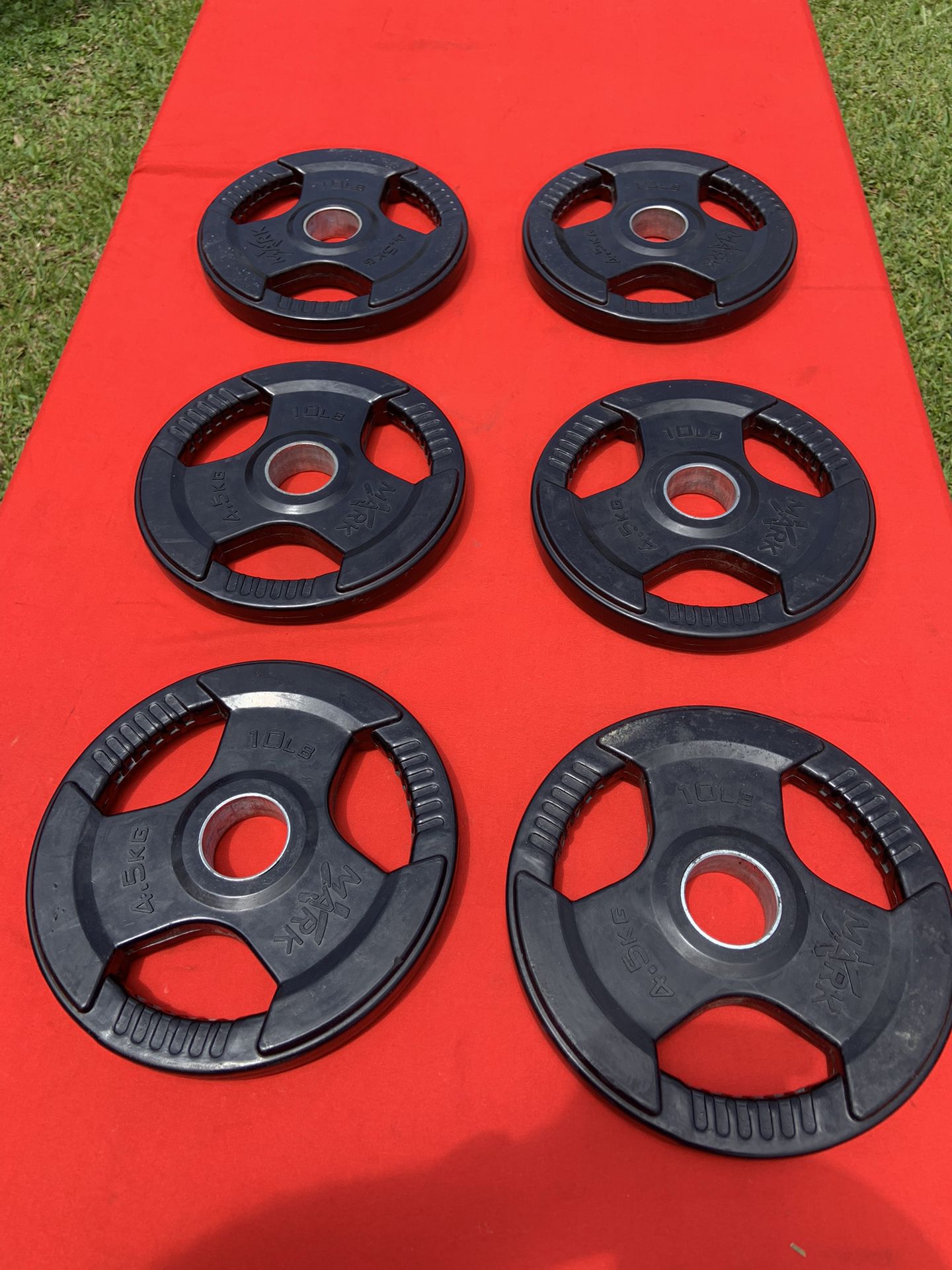 XMark Tri Grip Olympic Weight Plates