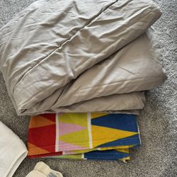 2 blankets, 3 bath towels, 3 face towels and 6 kitchen towels, all for $15