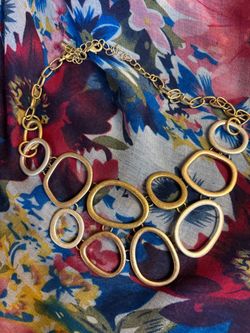 Beautiful gold and silver tone asymmetrical necklace