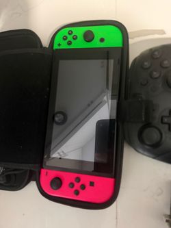 Nintendo Switch with Neon Green and Pink Joy-Cons