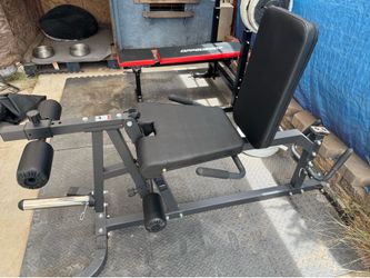 Leg extension-curl machine. Seated leg extension and lying curl machine