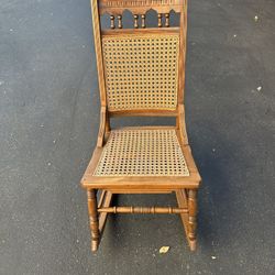Early American Rocking Chair With Cane Seat And Back