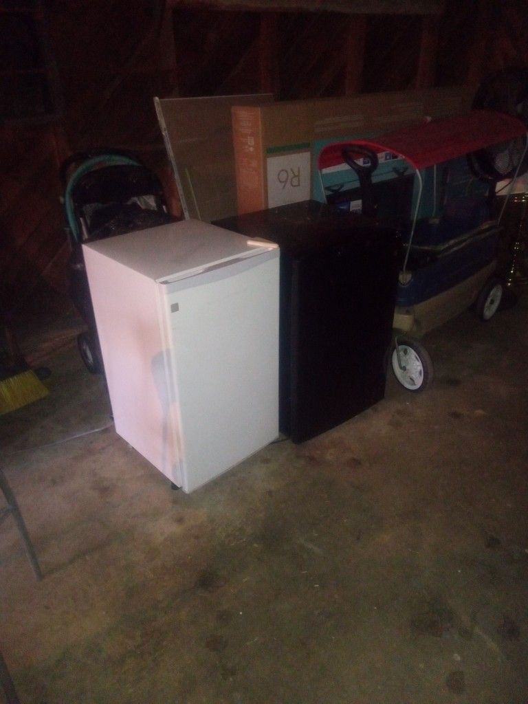 White & Black G.E Refrigerator
