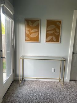 Gold and tempered glass table