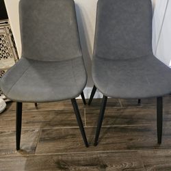 Two Faux Leather Dining Chairs