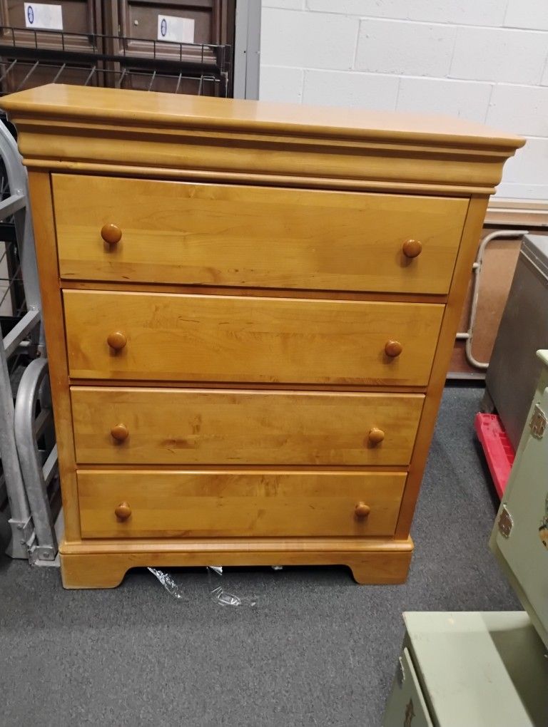 Tall solid wood dresser in great condition