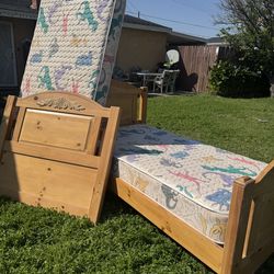 Nice 2 twins beds with mattress sets and  I have everything to puit together