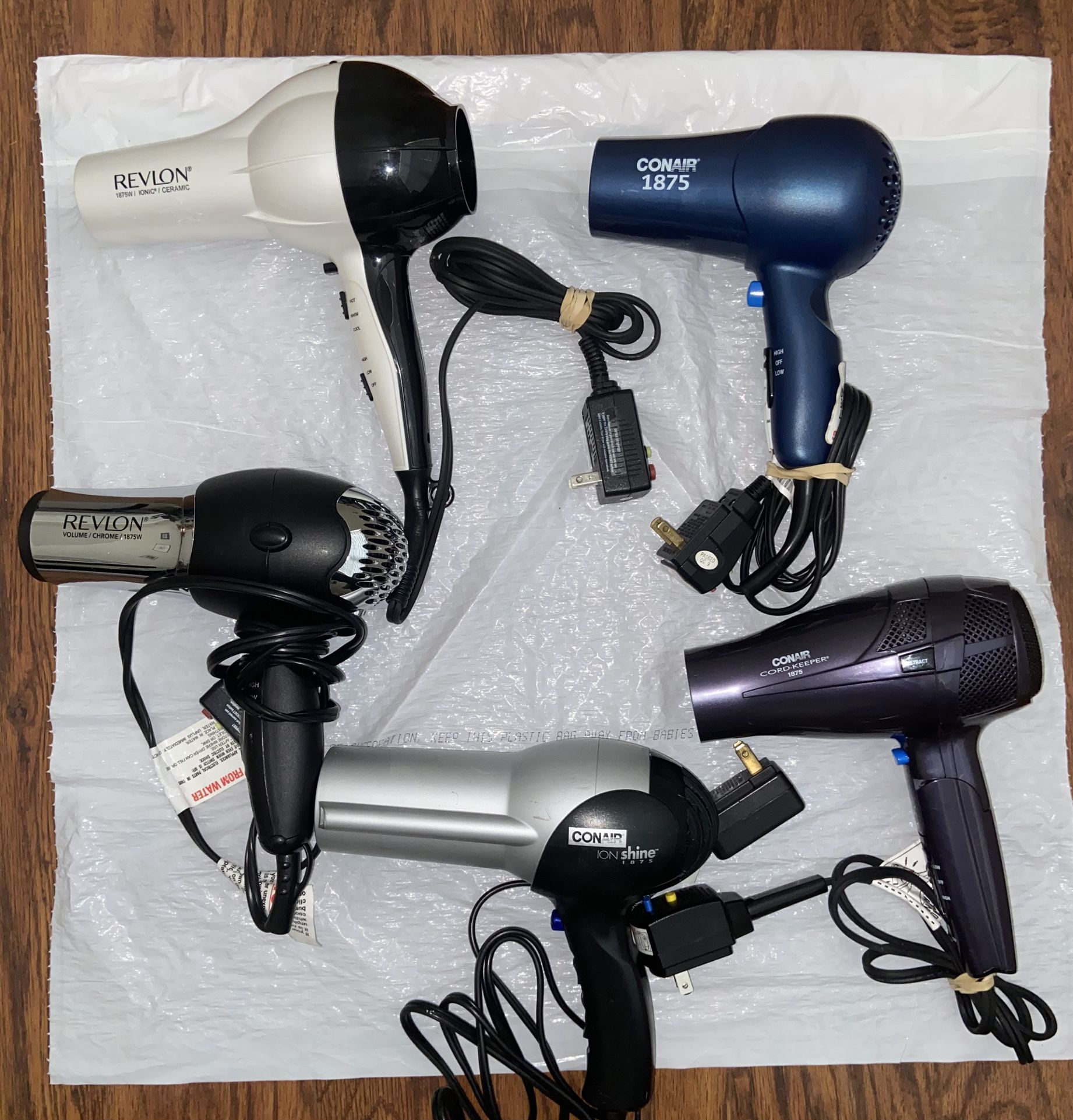 5/ Hair Dryer. 2 REVLON 1875W And 3 CONAIR 1875, ION Shine 1875,and CONAR CORD KEEPER 1875