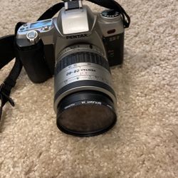 Pentax ZX-7 35mm film camera with 28-80mm lens. Needs Battery