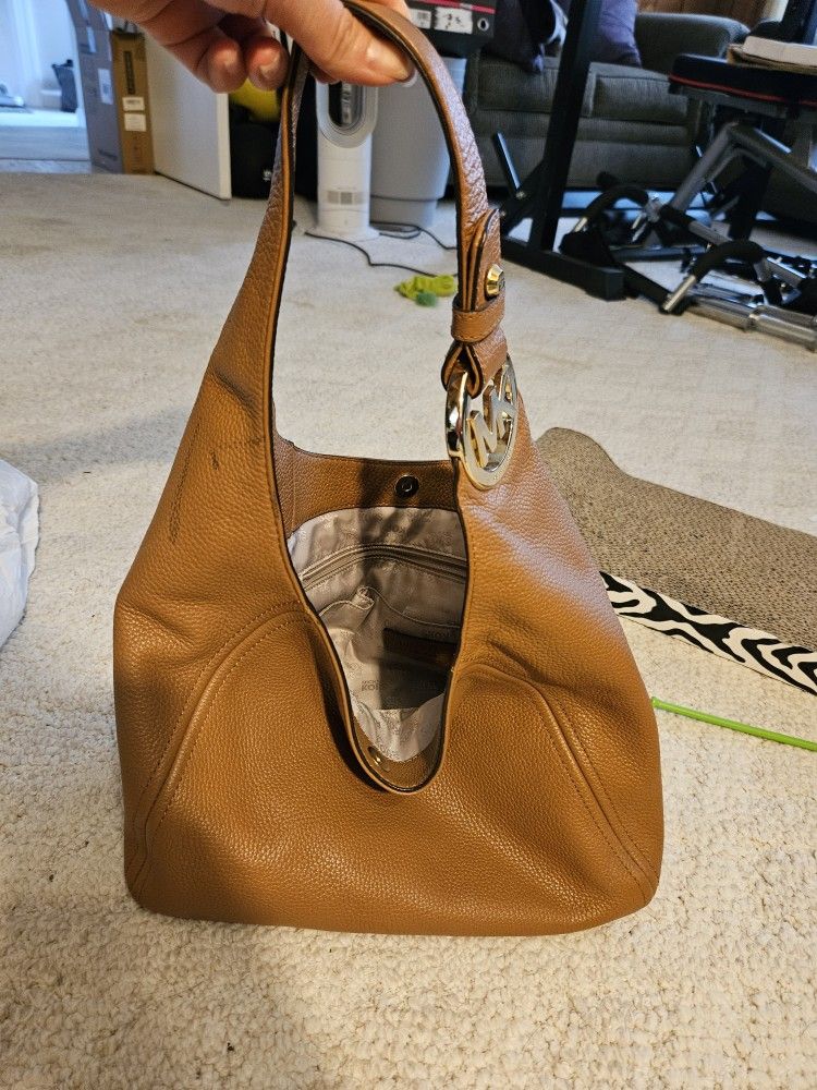 Brown Leather Michael Kors Purse And Wallet