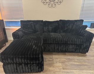 Black fluffy couch