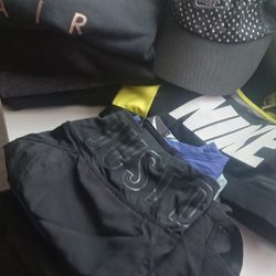 Stack Of Womans Nike Clothes