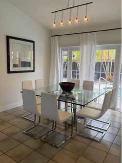 ARTEFACTO DINING TABLE. Glass top 3/4” thick and 70”x70”