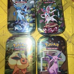 Prismatic evolutions Tins Pokemon 