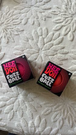 2 Needoh fuzz balls