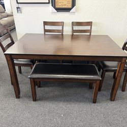 Dining table with 4 chairs and a bench