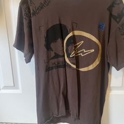 Kaws. Brown and tan graphic tee