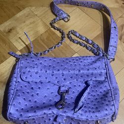 Charming Charlie very soft faux leather with beautiful lining and accents. Lavender in color