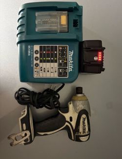 Makita BTD142 18V Lithium with Charger and 18v 5 Amp battery