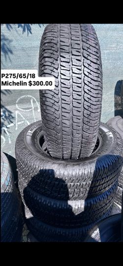 SET OF FOUR USED TIRES ALMOST NEW 275/65/18 ,MICHELIN A/T 