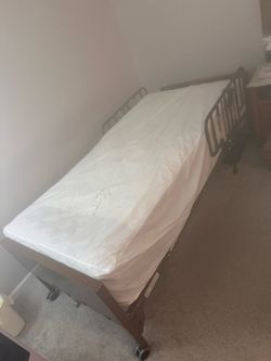 Reclining plug in bed with mattress