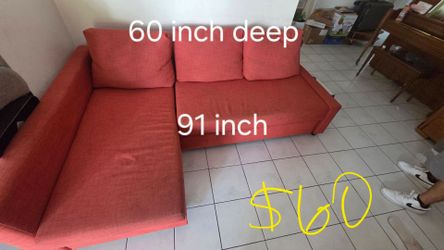 Sectional sofa with pull out bed