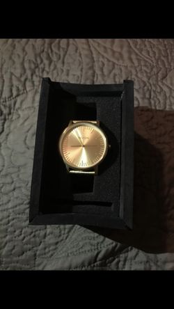 Nixon gold watch