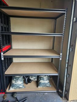 Two of the metal shelves,and extra pieces, and 1 of the black plastic one,