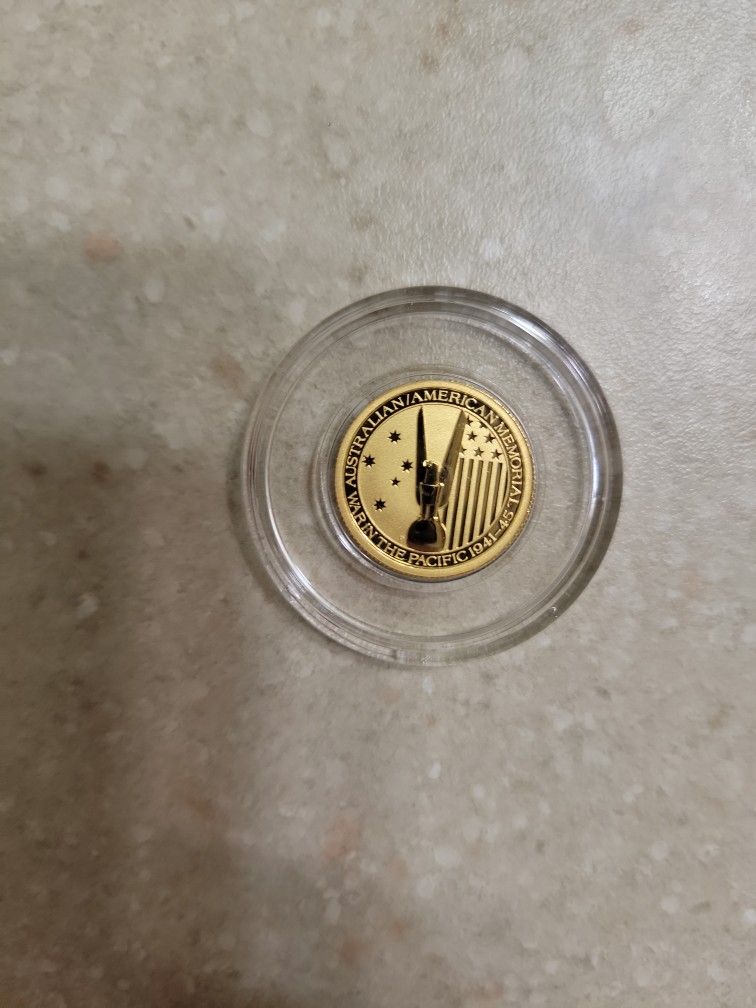 2013 Australia War In The Pacific 1/10 Oz 999.9 Gold Coin. BU