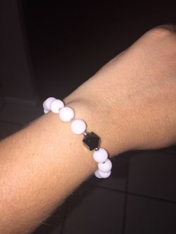 White porcelain bracelet with black crystal charm $6