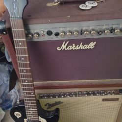 Marshall Amplifier And Epiphone Les Paul Guitar