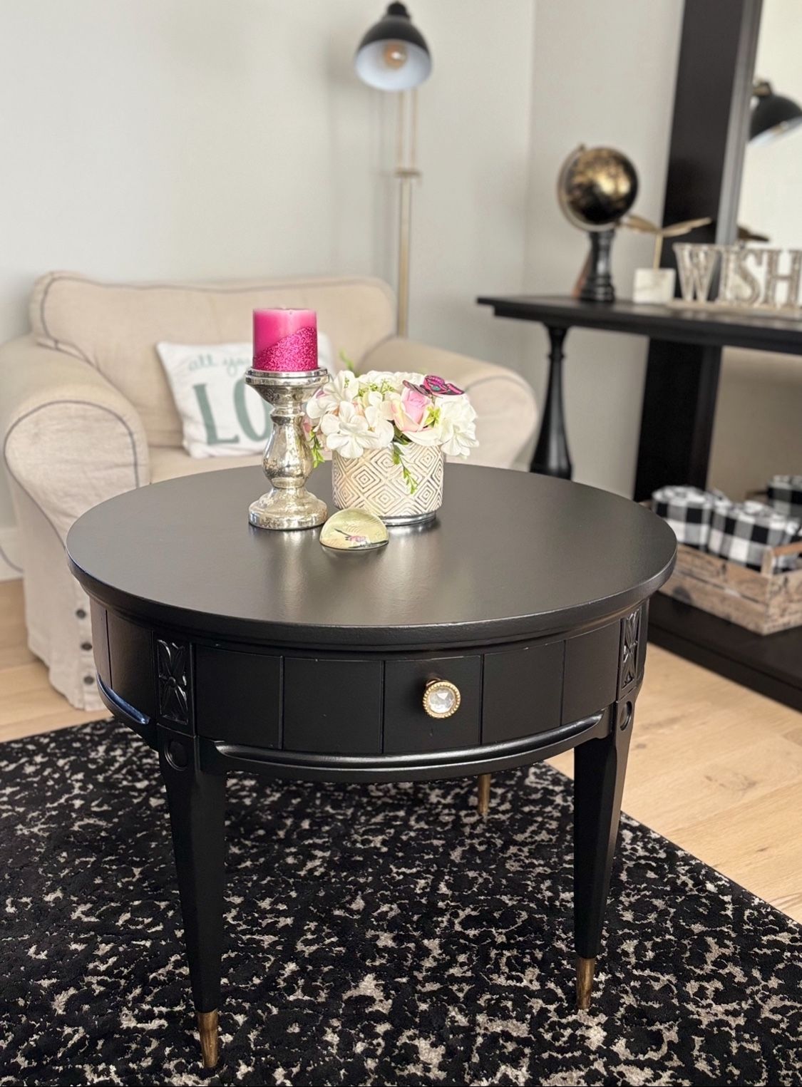 Black Round Table with Gold Tipped Legs 28’W x 22’Tall