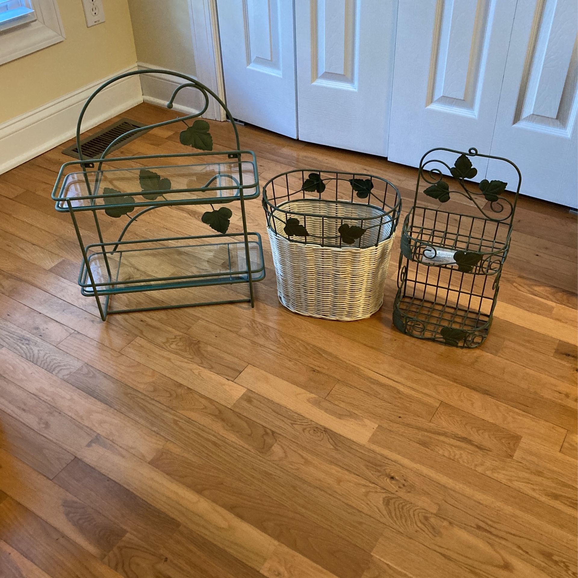 Green Metal Shelves  And Trash Can With Leaf Design