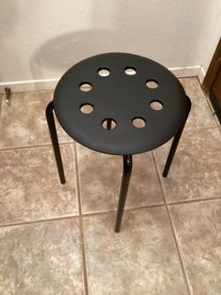 Four Black Plastic Bar Stools with Legs