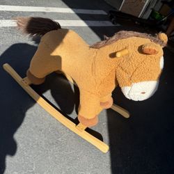 Rocking Horse, Dog Riding Toy And Basketball Hoop