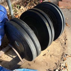25s 15s & 10lb Bumper Plates With Rollable Plate Rack
